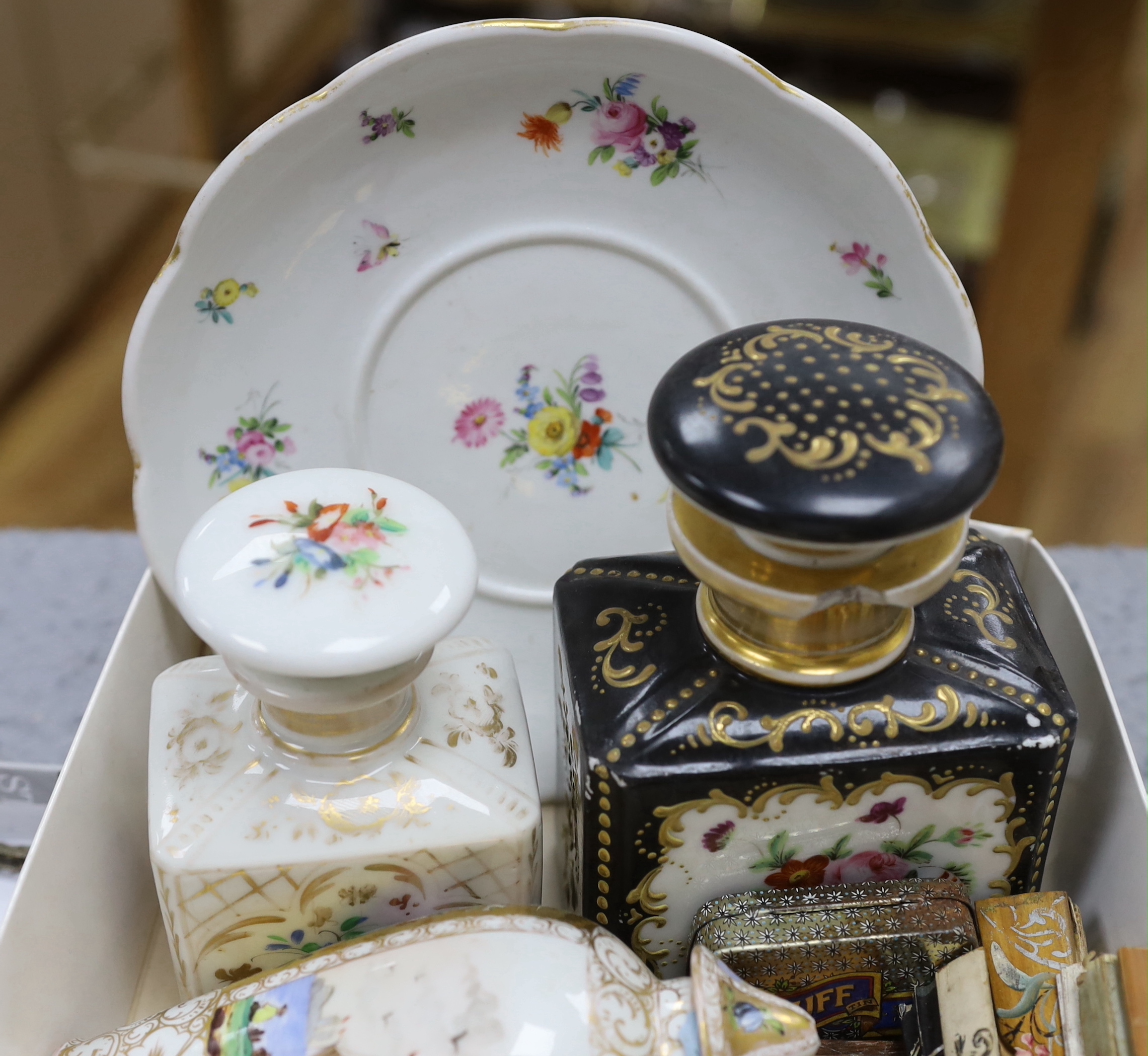 A collection of cabinet curiosities, including carved lava portrait medallions, porcelain scent bottles, etc. (a large quantity)